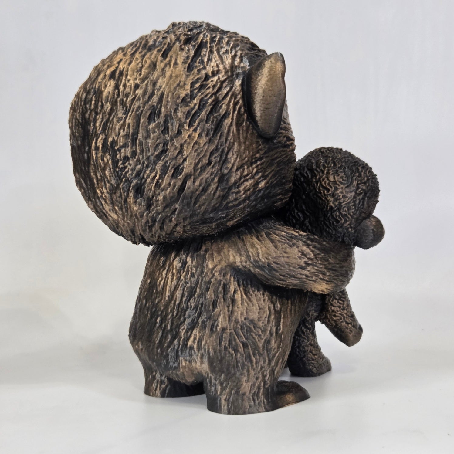 Punch the Monkey with Stuffed Animal Statue