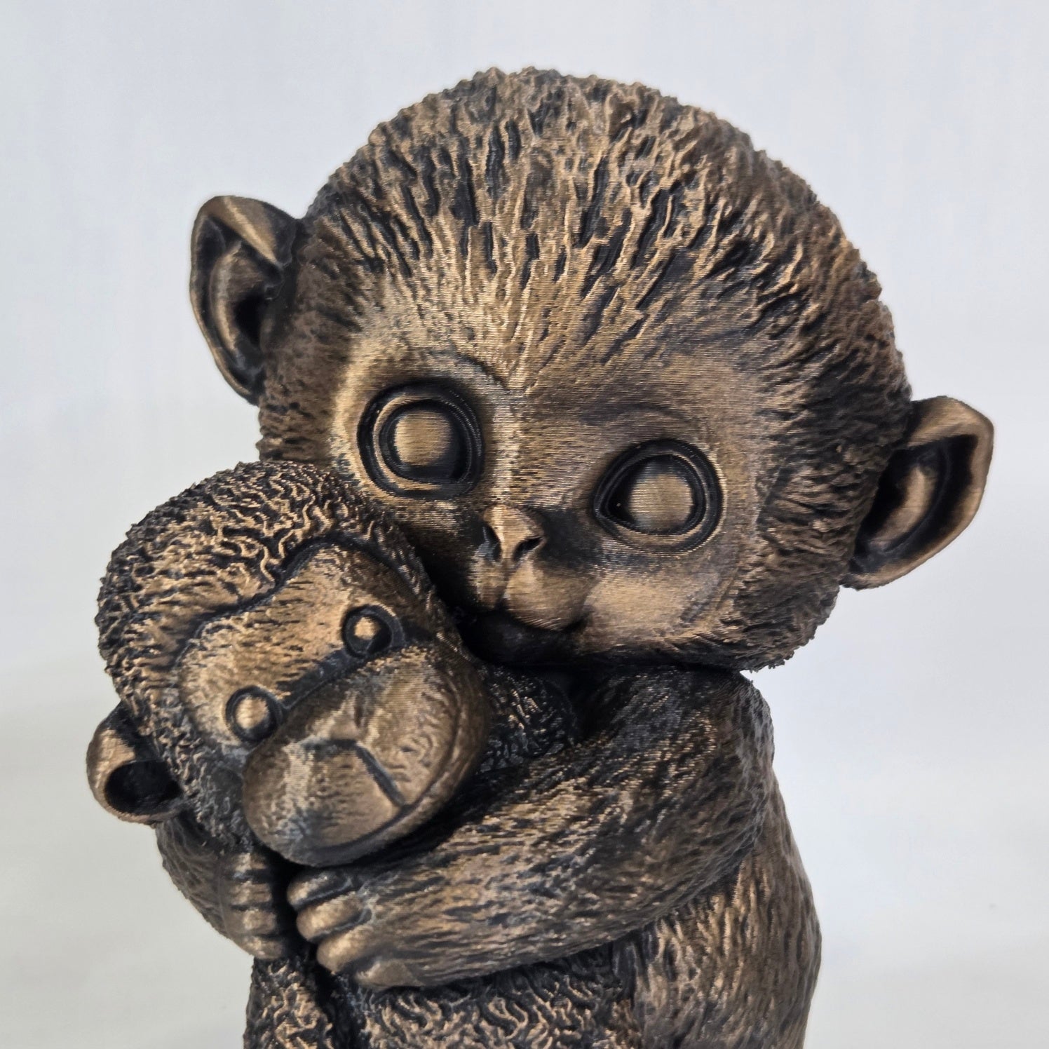 Punch the Monkey with Stuffed Animal Statue